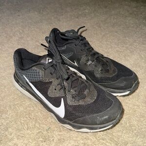 Nike Black Athletic Shoes with Mesh Upper and Low-Top Design